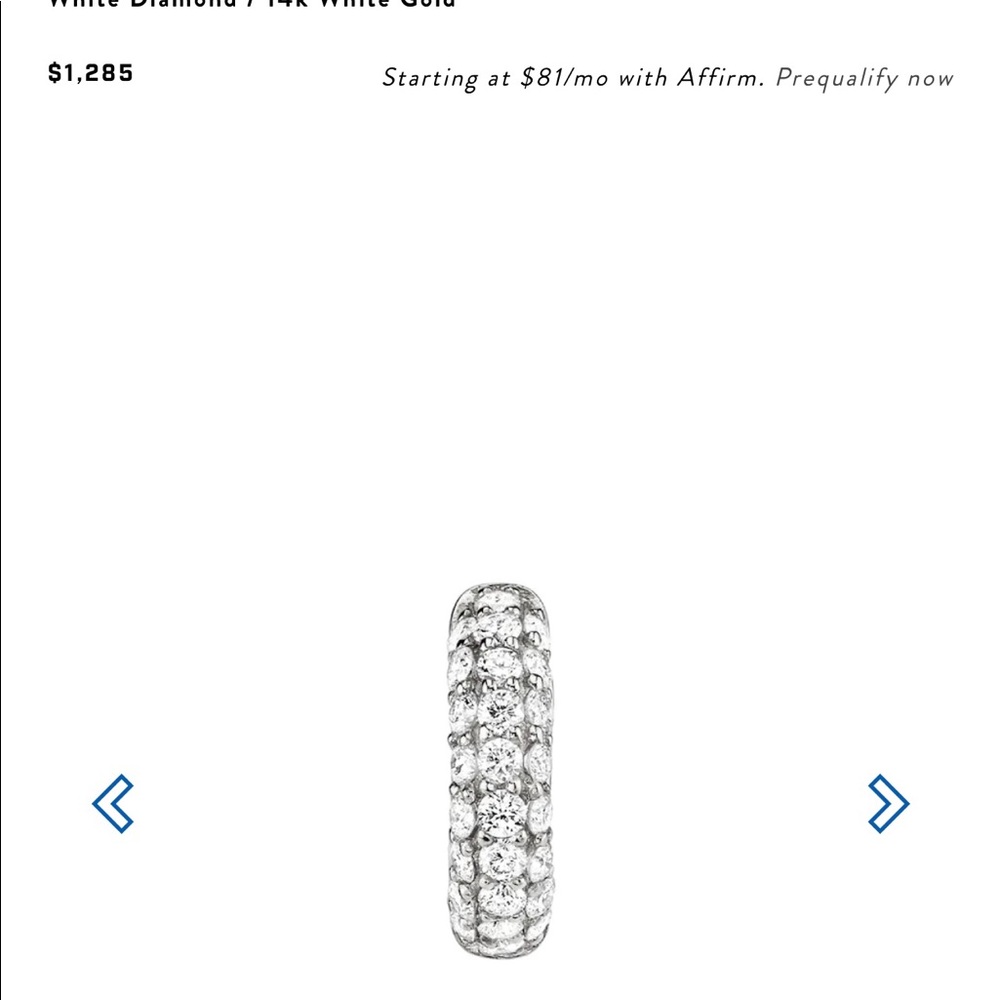 The jewelry brand Last Line pave white hoop #4 in white gold. Huggie hoop style